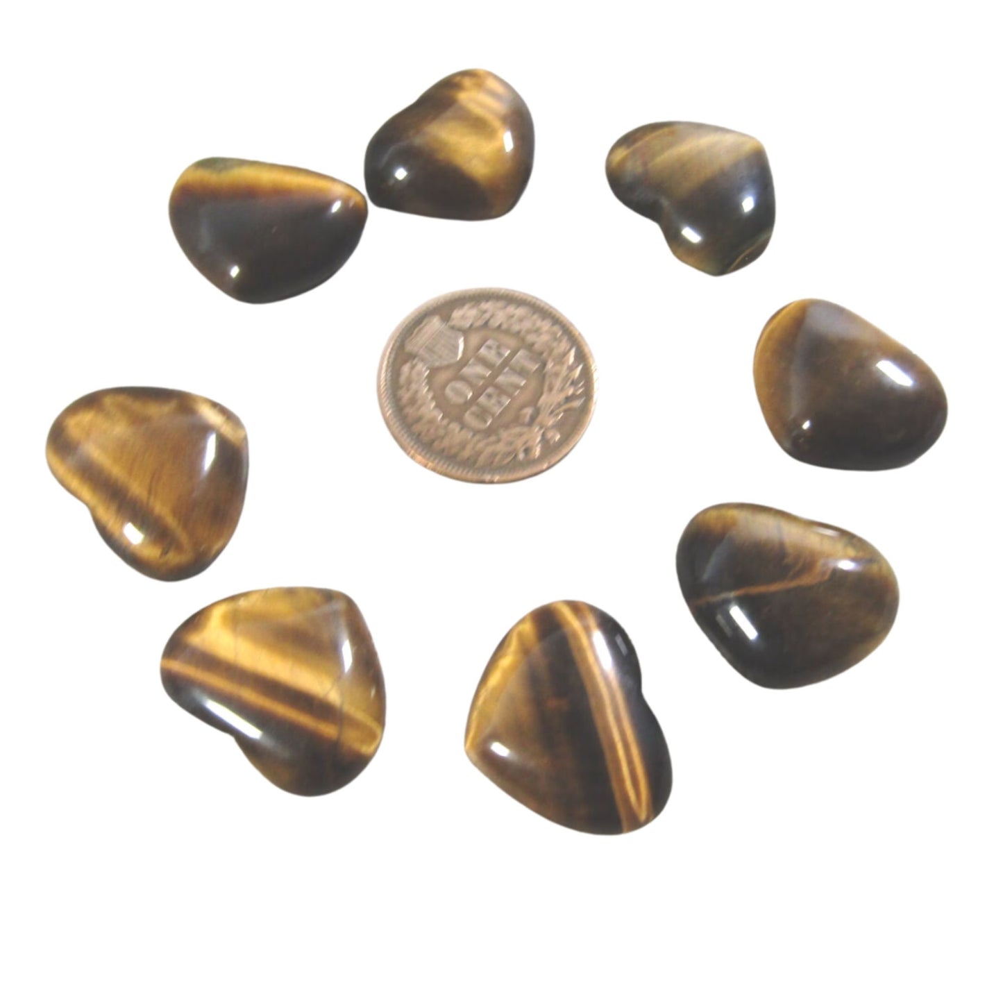 Polished Tiger’s Eye crystal stones in a heart shape, showcasing golden-brown hues.